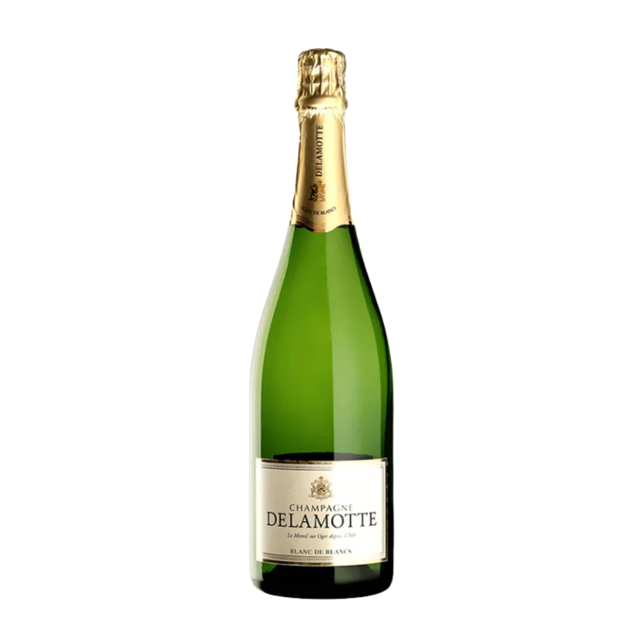 Champagne Delamotte Blanc de Blancs - Une expression pure du Chardonnay, minéralité raffinée et bulles aériennes. Idéal pour un apéritif chic ou un repas gastronomique